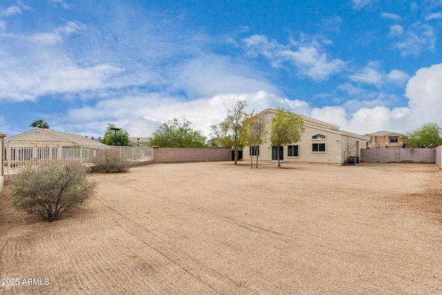 view of yard with a fenced backyard