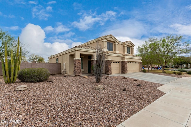 view of front facade featuring fence, concrete driveway, stucco siding, a garage, and stone siding