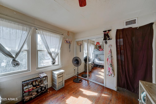 miscellaneous room with wood-type flooring