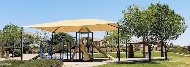 communal playground featuring a yard