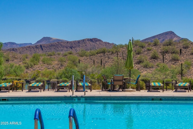 view of pool featuring a mountain view