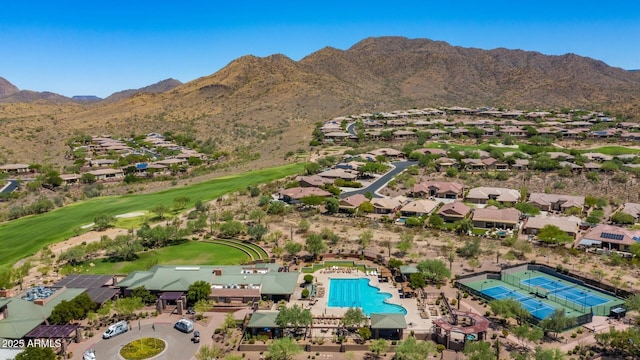 birds eye view of property featuring a mountain view