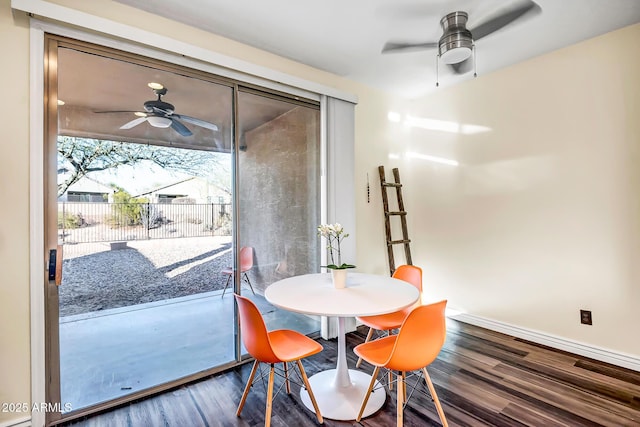 dining space featuring hardwood / wood-style floors and ceiling fan