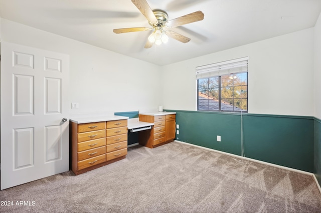 office area with light carpet and ceiling fan