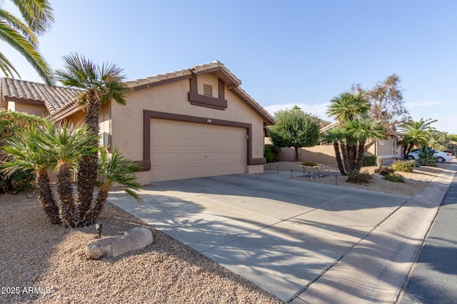 view of front of home with a garage