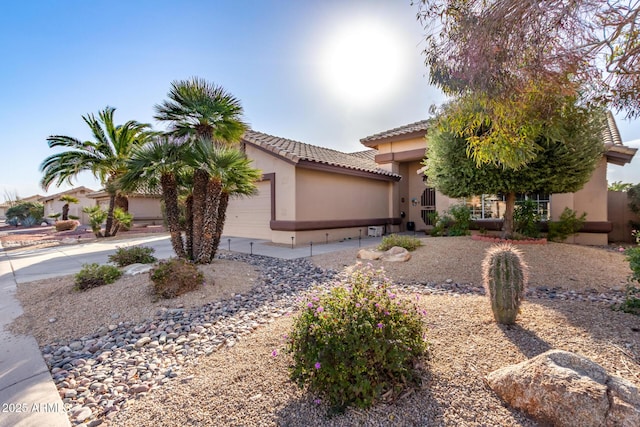 view of front of home with a garage