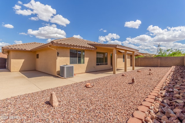 back of house featuring a patio, a pergola, and central air condition unit