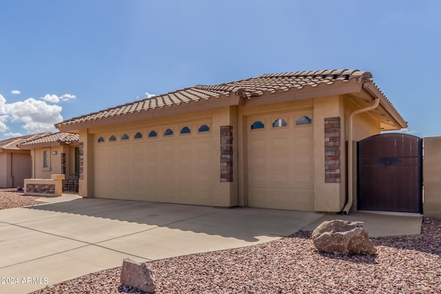 view of front of home with a garage