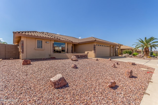 view of front of property with a garage