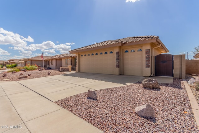 view of front of home with a garage