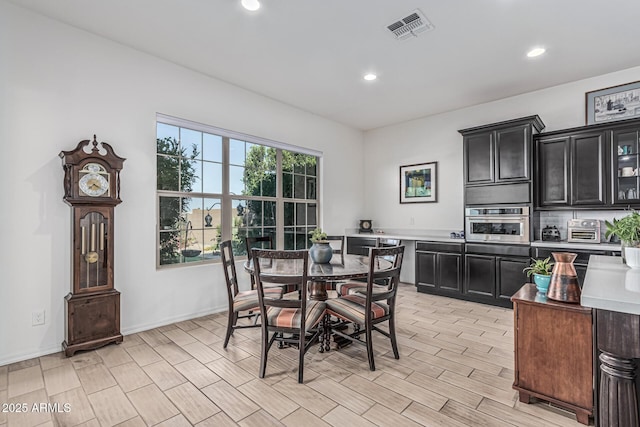 7813 S 43rd Pl, Phoenix, AZ 85042 - dining area featuring recessed lighting, baseboards, and light wood finished floors