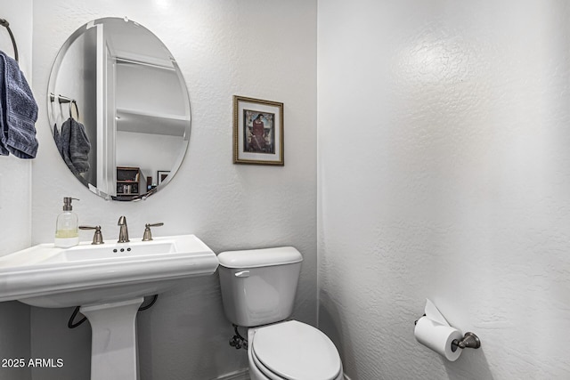7813 S 43rd Pl, Phoenix, AZ 85042 - half bathroom with toilet and a sink