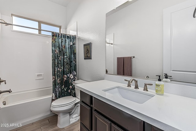 7813 S 43rd Pl, Phoenix, AZ 85042 - bathroom featuring vanity, shower / bathtub combination with curtain, toilet, and wood finished floors