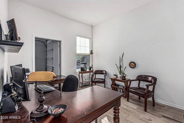 7813 S 43rd Pl, Phoenix, AZ 85042 - home office featuring light wood-style floors and baseboards