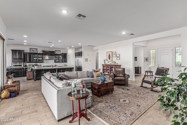 7813 S 43rd Pl, Phoenix, AZ 85042 - living room featuring recessed lighting