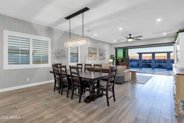 dining space featuring ceiling fan