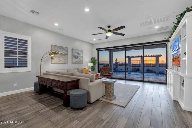 living room with ceiling fan