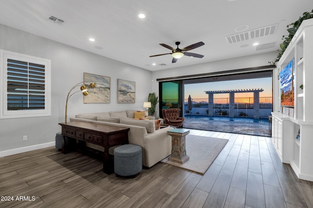 living room featuring ceiling fan