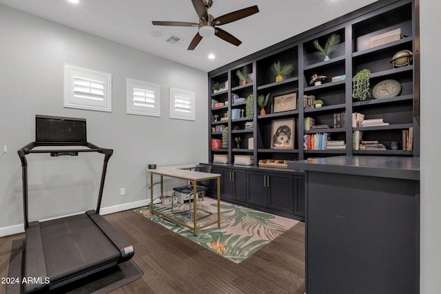 office with ceiling fan and dark hardwood / wood-style flooring