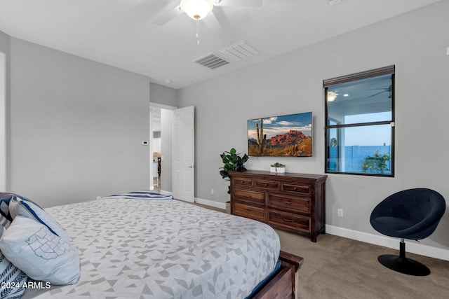 bedroom featuring ceiling fan and light colored carpet