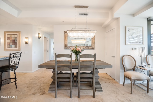 dining room with a chandelier