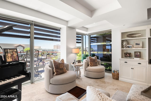 living area featuring plenty of natural light