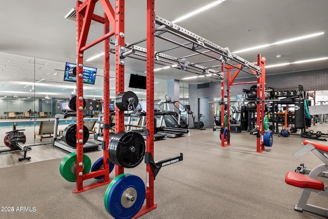 gym featuring wood-type flooring