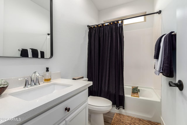 full bathroom featuring shower / tub combo, vanity, hardwood / wood-style flooring, and toilet