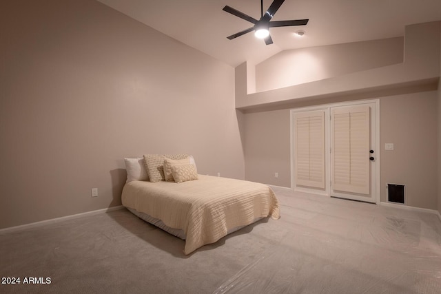 carpeted bedroom featuring ceiling fan and high vaulted ceiling