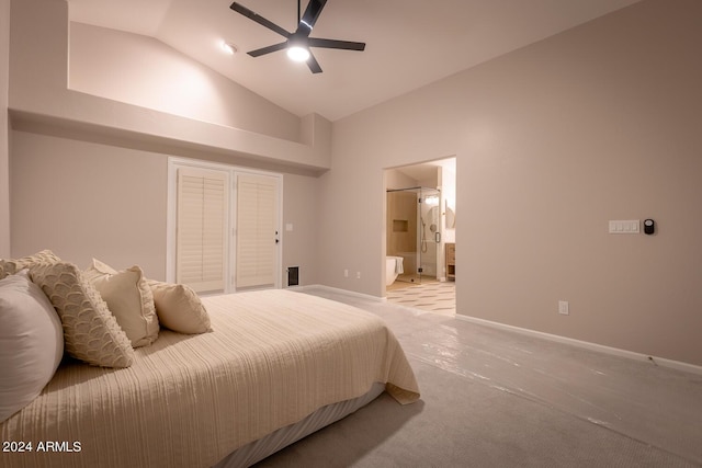 carpeted bedroom with connected bathroom, high vaulted ceiling, and ceiling fan