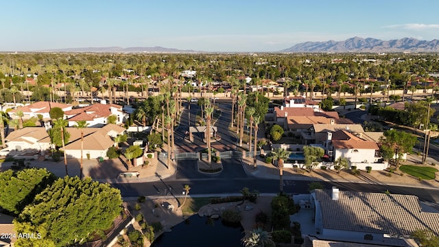 birds eye view of property featuring a mountain view