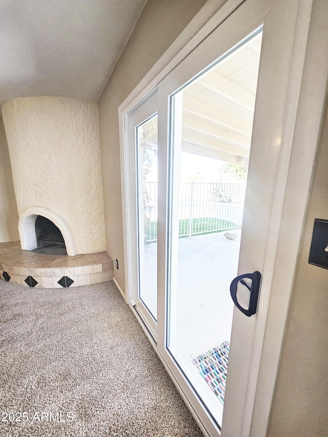 entryway with carpet flooring