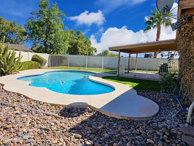 view of swimming pool with a fenced in pool, a fenced backyard, and a patio area