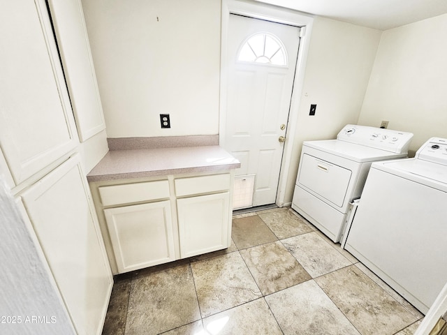 clothes washing area with cabinet space and washing machine and dryer