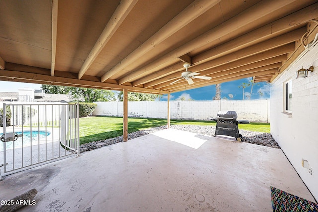 view of patio featuring ceiling fan and a fenced backyard