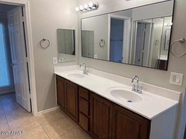 bathroom featuring vanity and tile patterned flooring