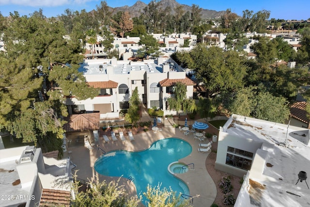 bird's eye view with a residential view and a mountain view