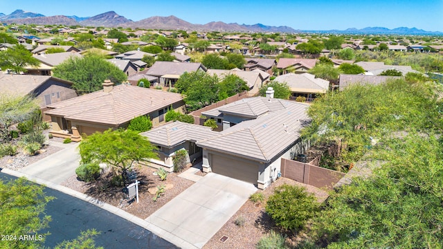 birds eye view of property featuring a residential view and a mountain view