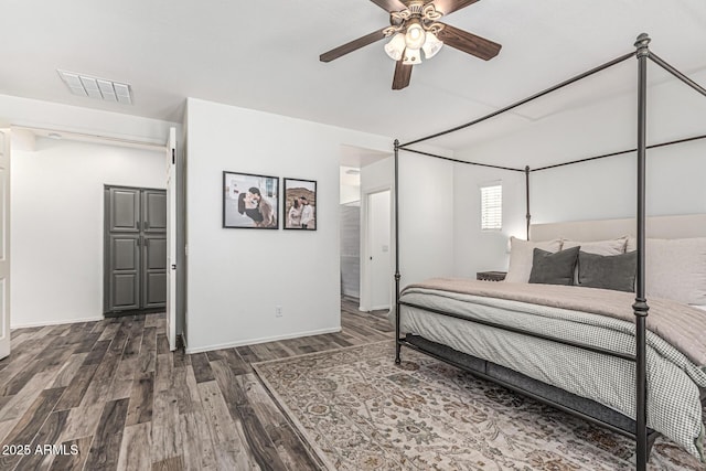 3109 N Black Rock Rd, Buckeye, AZ 85396 - bedroom featuring wood finished floors, baseboards, and ceiling fan