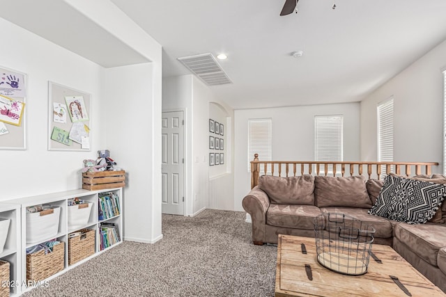 3109 N Black Rock Rd, Buckeye, AZ 85396 - living area with carpet floors, ceiling fan, baseboards, and recessed lighting