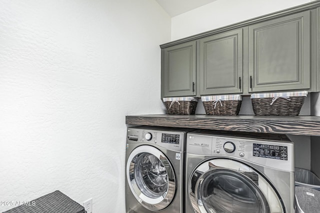 3109 N Black Rock Rd, Buckeye, AZ 85396 - laundry room featuring cabinet space, washer and dryer, and a textured wall