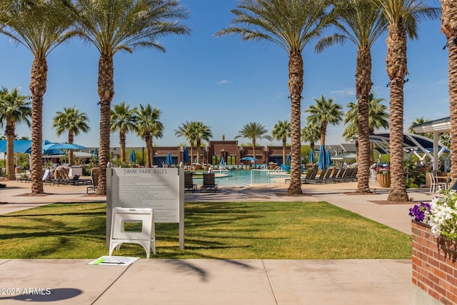3109 N Black Rock Rd, Buckeye, AZ 85396 - view of swimming pool featuring a lawn