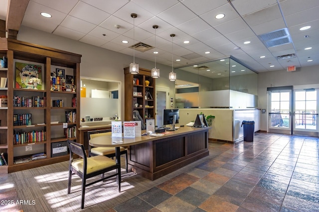 3109 N Black Rock Rd, Buckeye, AZ 85396 - home office featuring a drop ceiling and baseboards