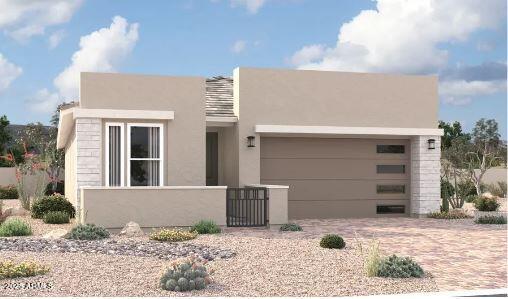 15802 W Vogel Ave, Goodyear, AZ 85338 - view of front of home with stucco siding, an attached garage, a fenced front yard, and driveway