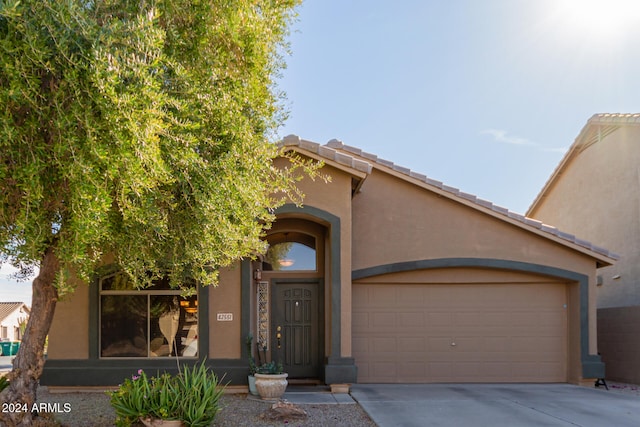 view of front of property featuring a garage