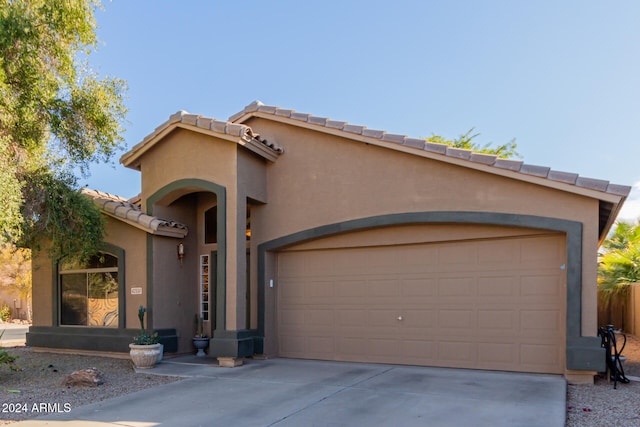 view of front of property featuring a garage