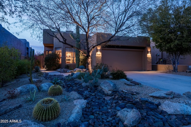 view of front of property with a garage