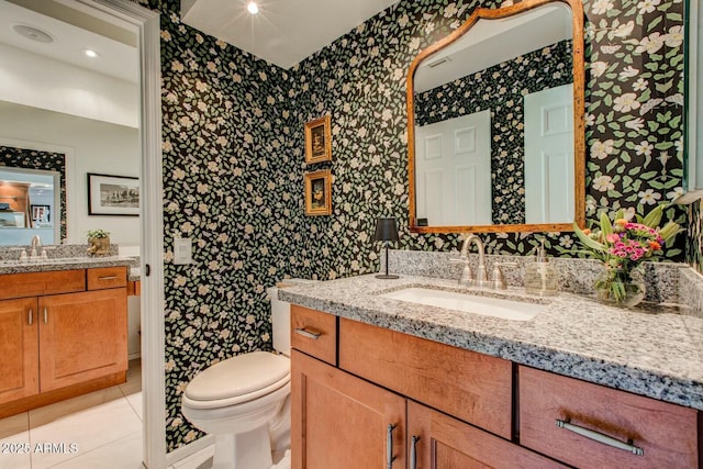 10015 E Mountain View Rd Unit 2012, Scottsdale, AZ 85258 - bathroom featuring a sink, tile patterned floors, toilet, and two vanities