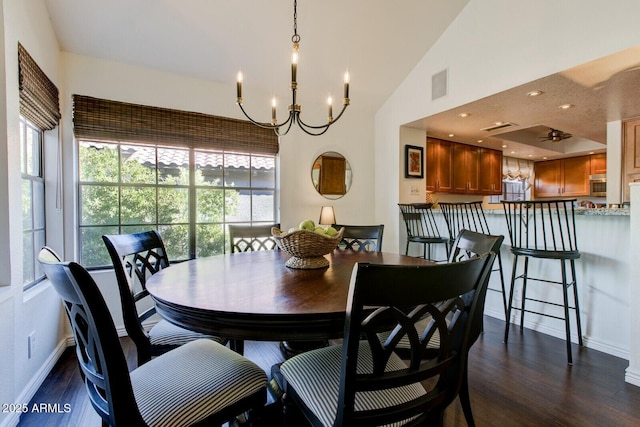 10015 E Mountain View Rd Unit 2012, Scottsdale, AZ 85258 - dining area featuring dark wood-style flooring, a notable chandelier, visible vents, and a wealth of natural light