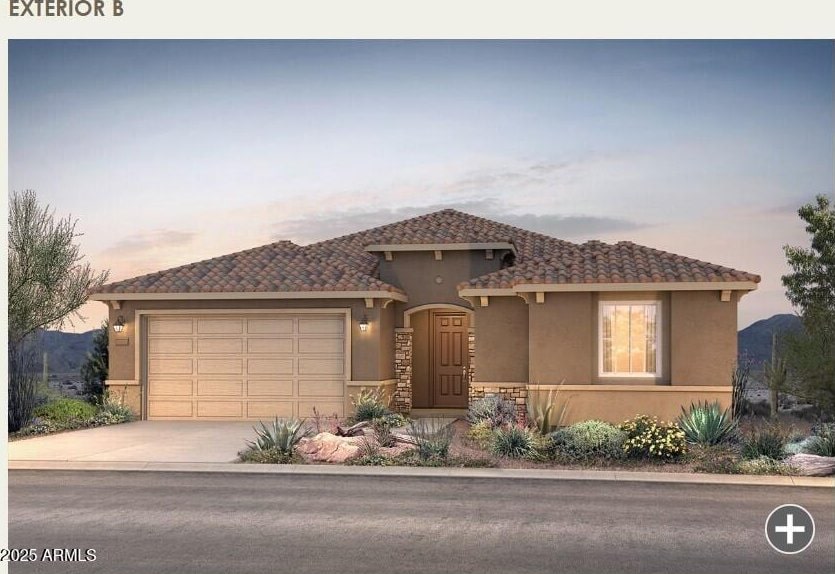 mediterranean / spanish-style house featuring stucco siding, driveway, a tile roof, and a garage